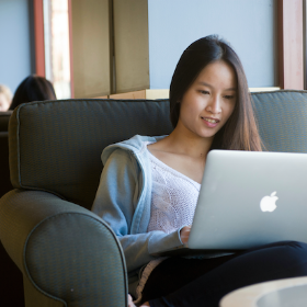 College of Online Application - Female student on laptop