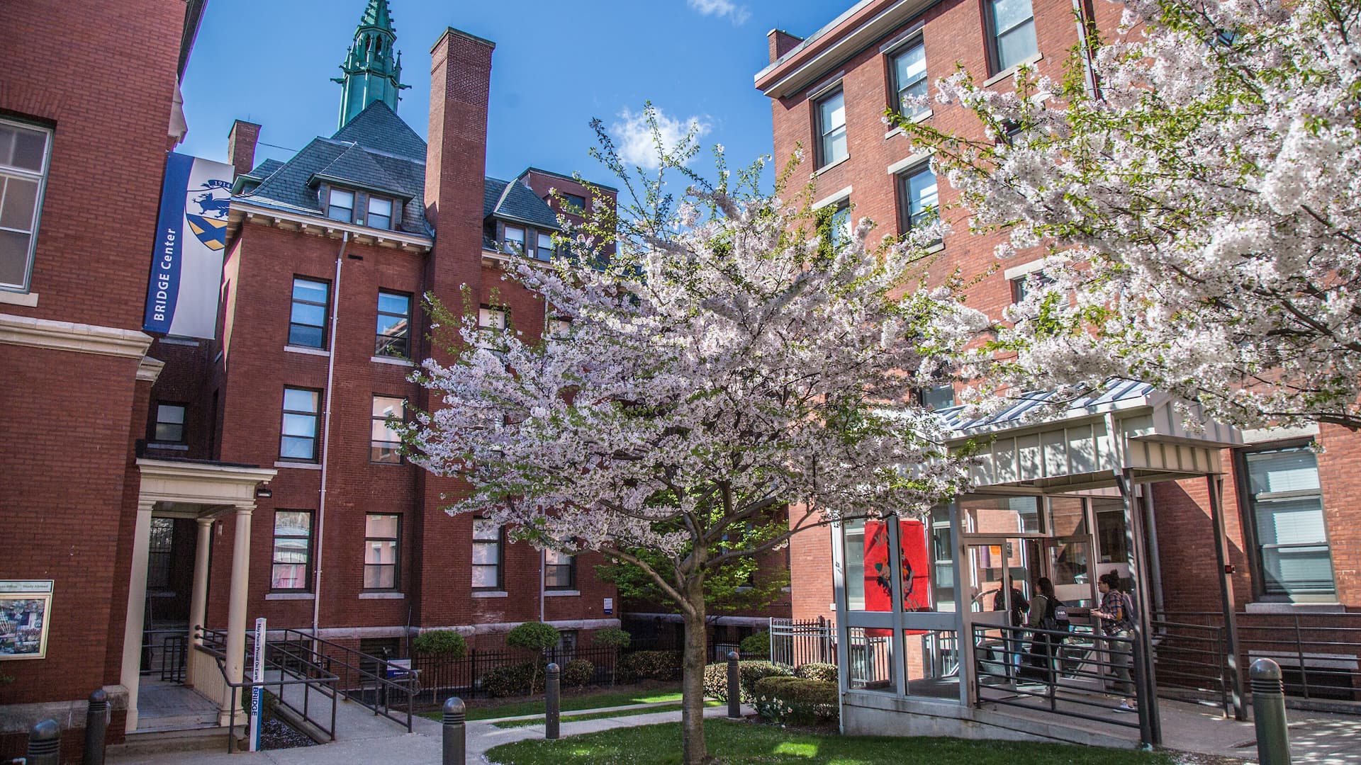 Exterior of Xavier Hall, with the BRIDGE on the left.