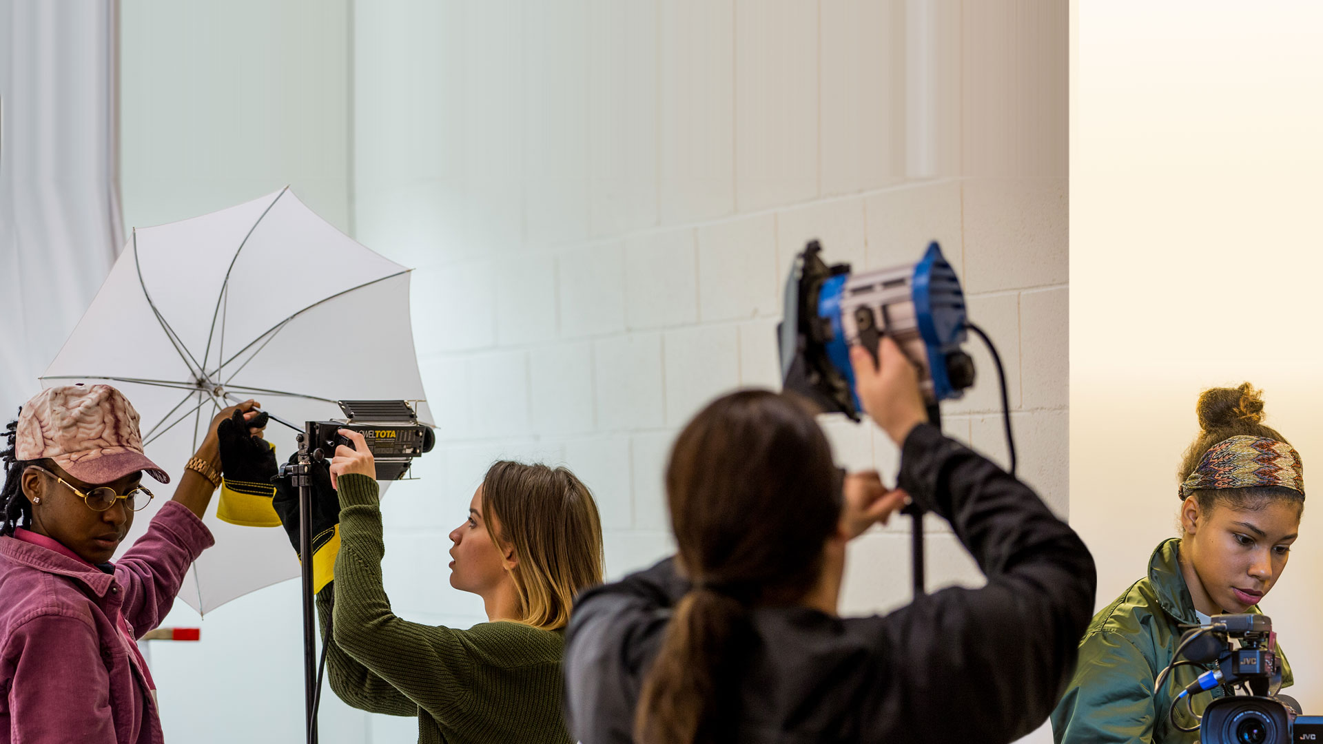 JWU students setting up film equipment in the Media & Communications program