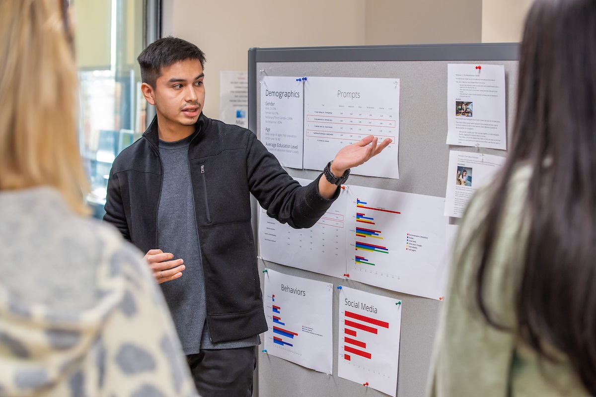 student giving business presentation