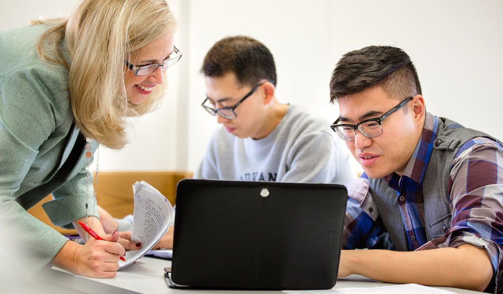 students at laptops