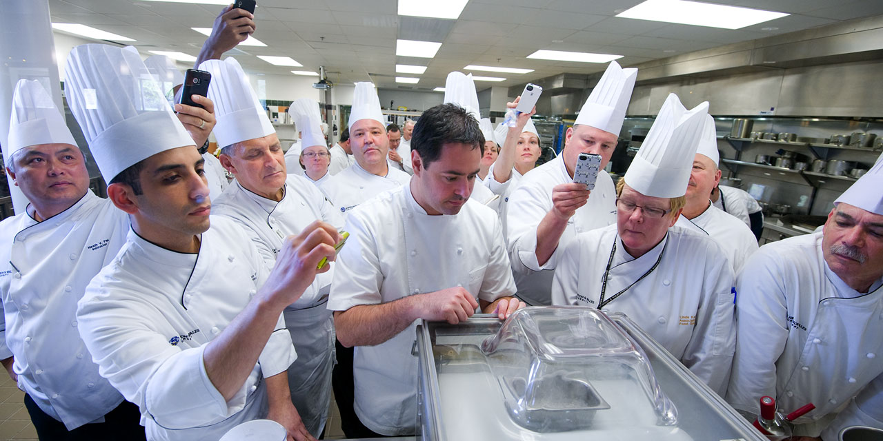 Chef Chris Young teaching a group of JWU Providence faculty members about modernist techniques.