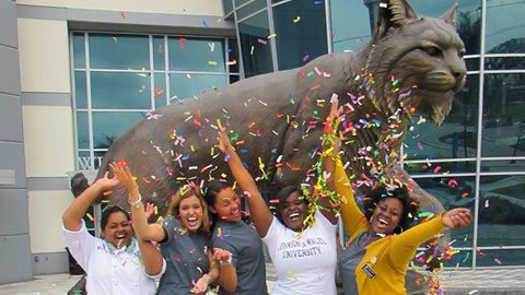 Students throwing confetti