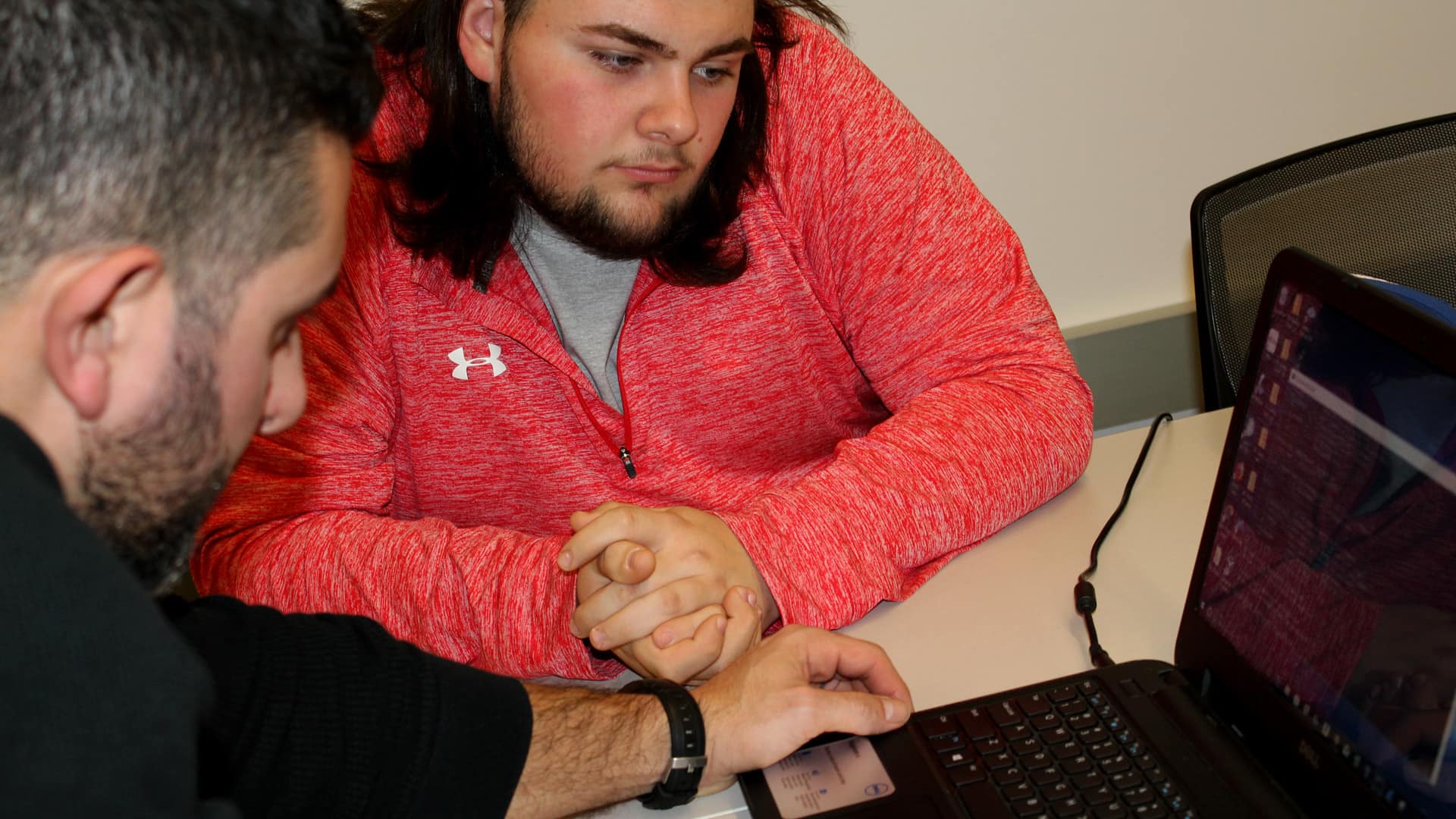 Brandon Catalan and a student.