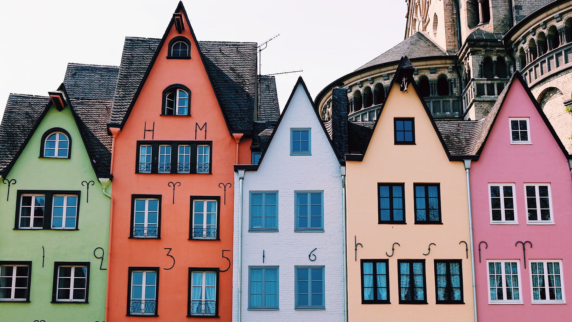 Colorful Amsterdam houses, all in a row.