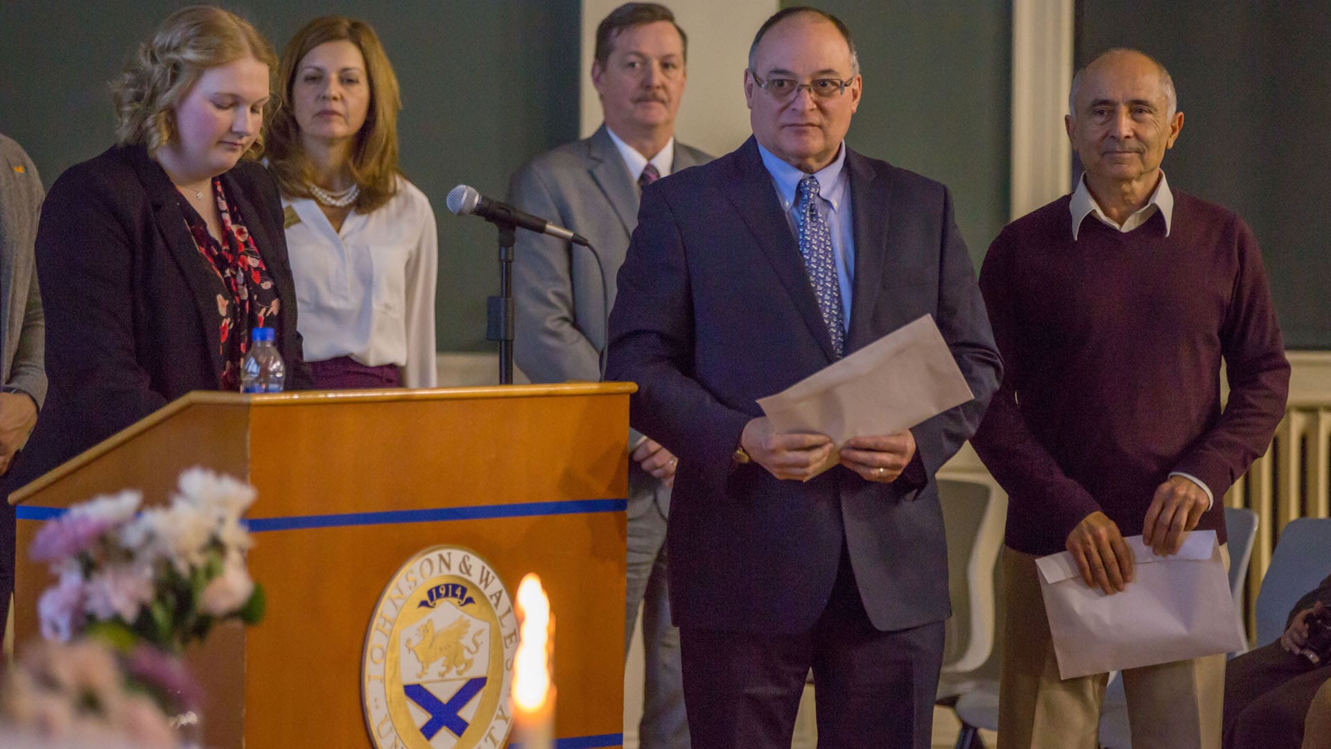 Professors Jim Sheusi and Sol Neeman during the induction ceremony.