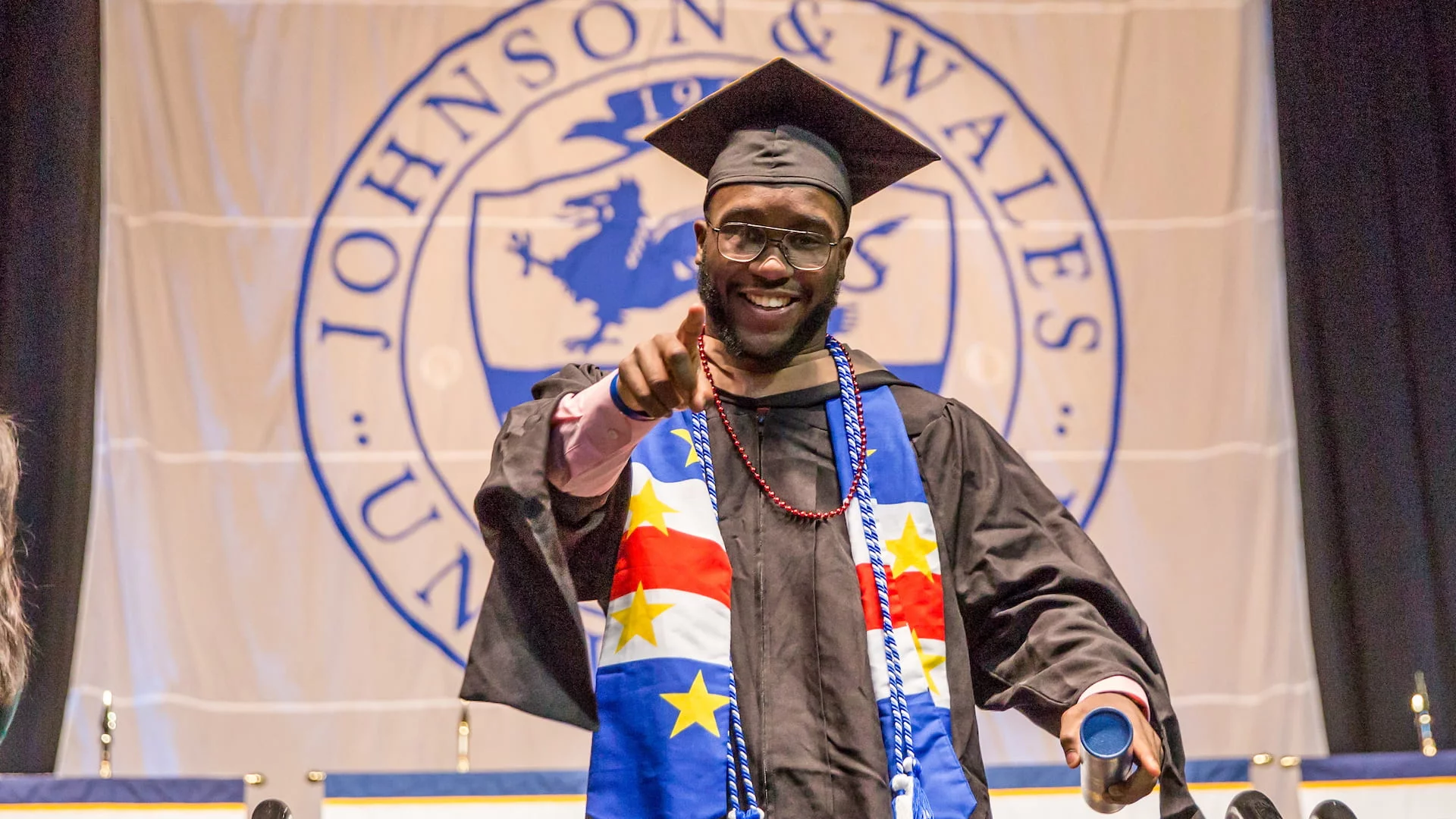 2019 Commencement happy graduate.