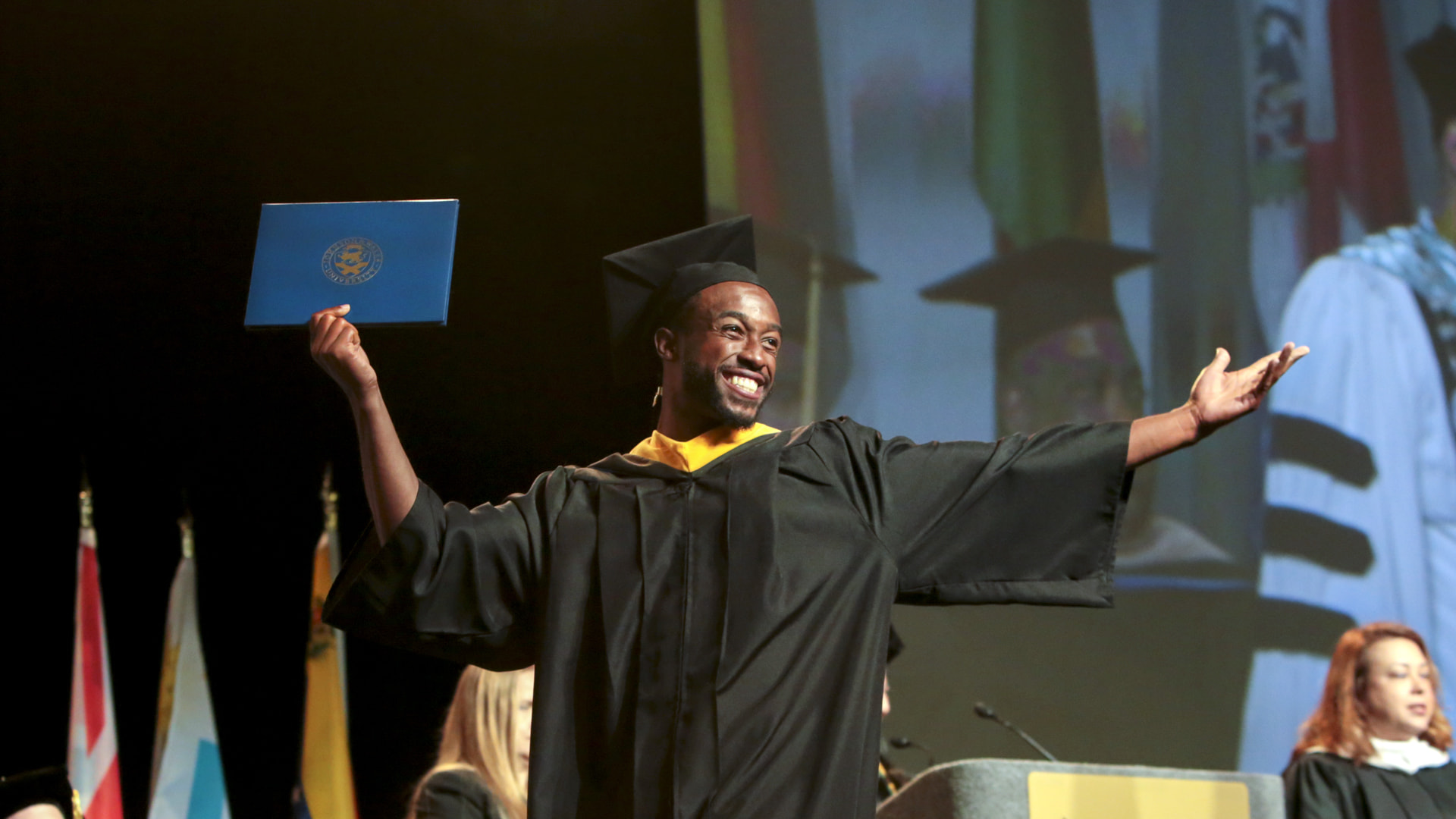 A joyful new graduate at JWU North Miami’s 2019 Commencement.