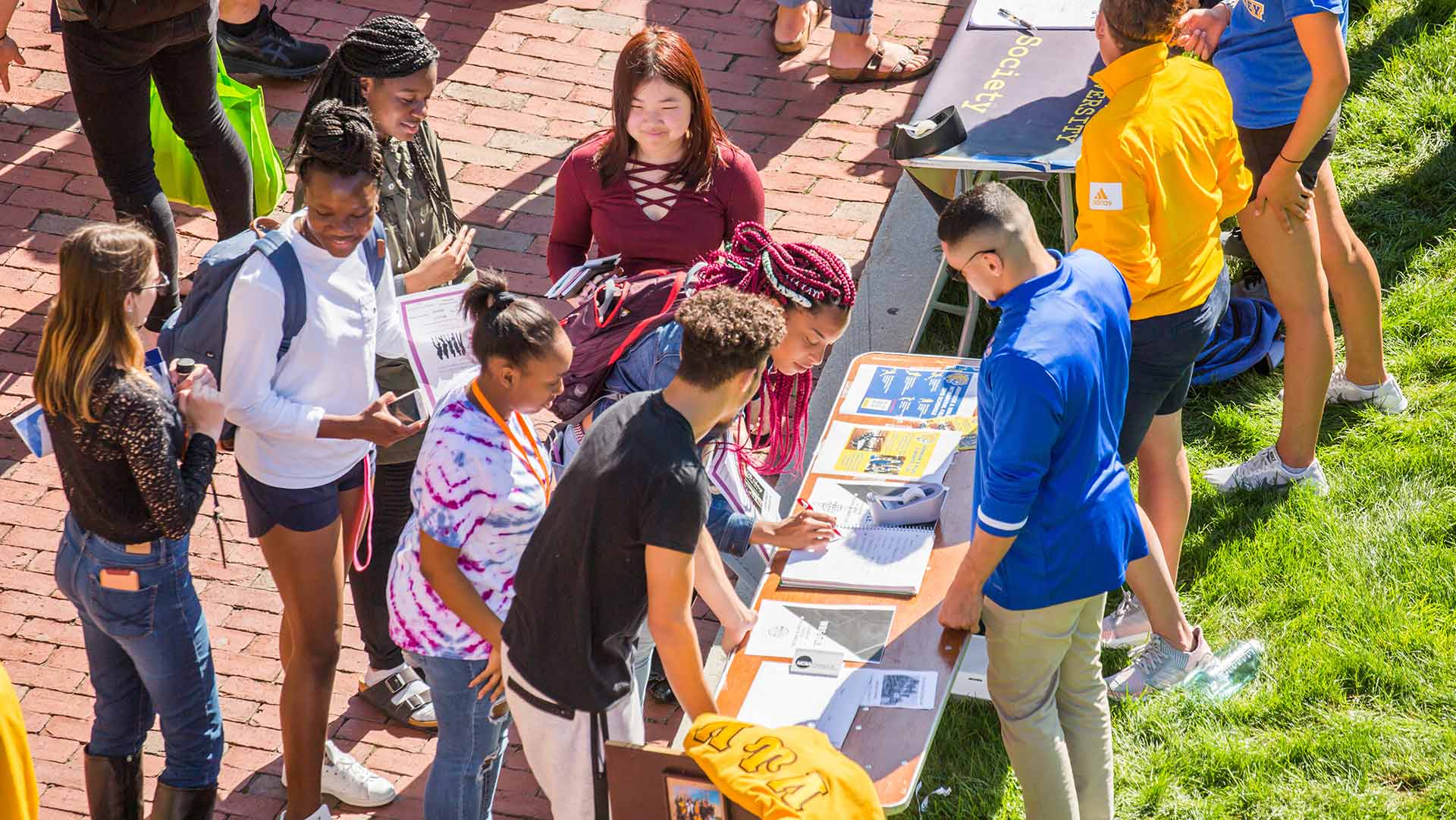 Students at sign up tables.