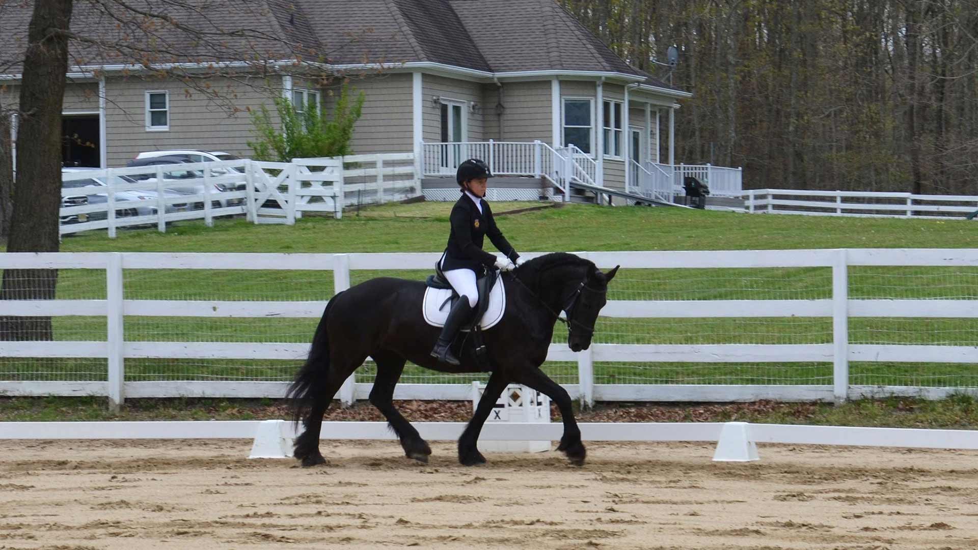 Emma riding a horse