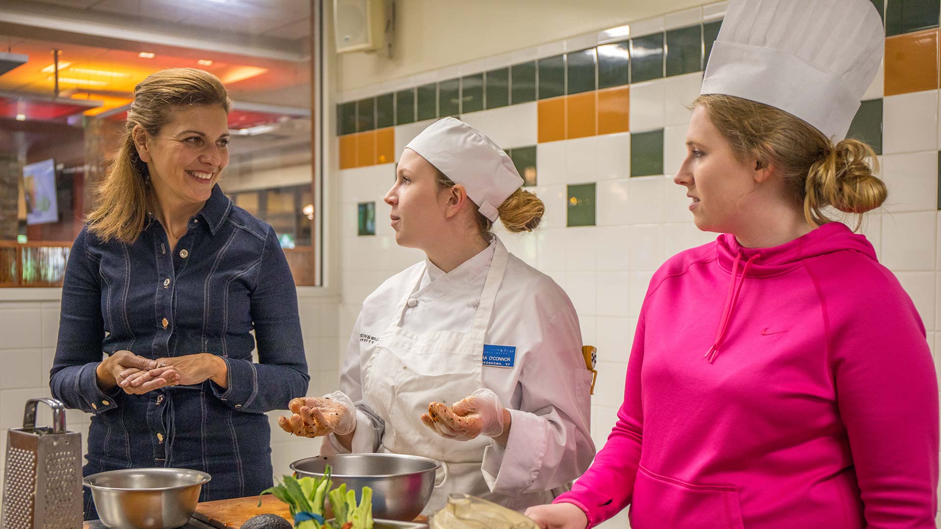 President Marie Bernardo-Sousa with students.