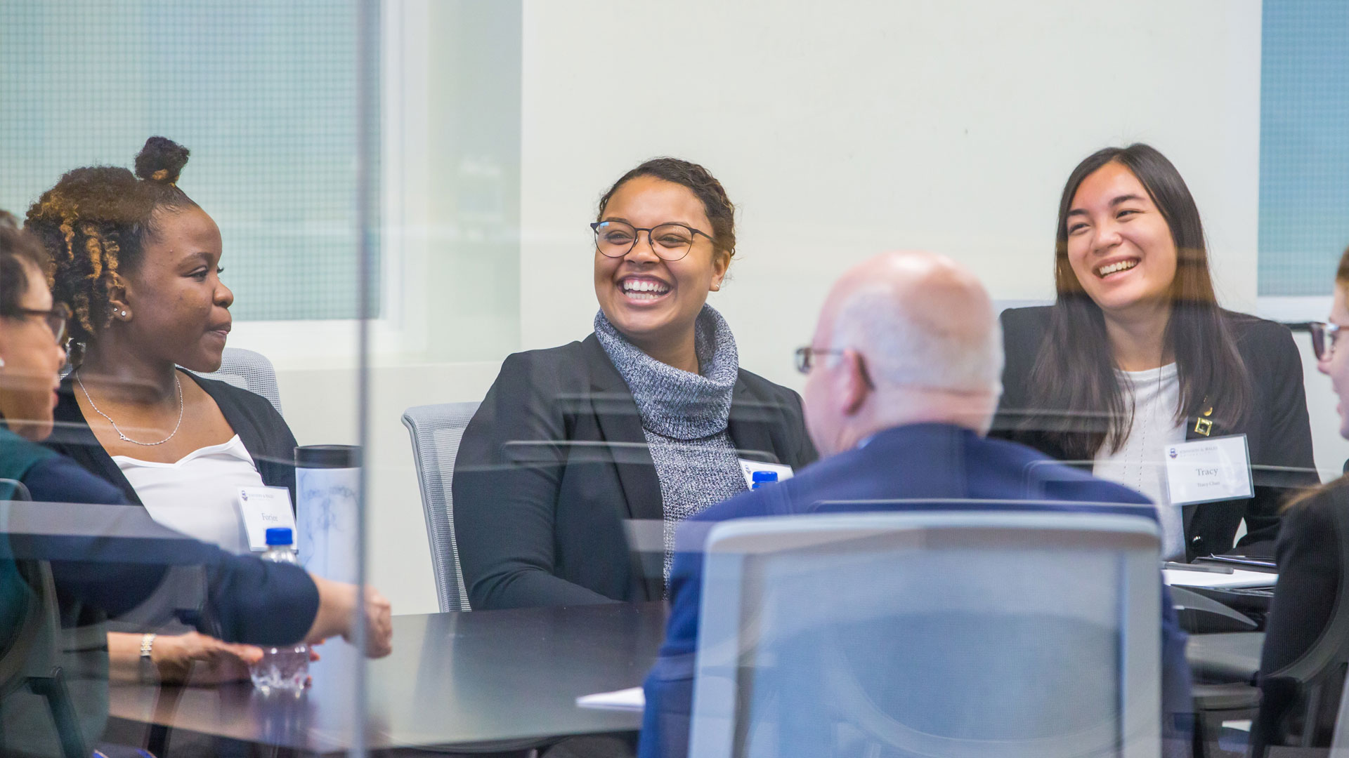 Students have round table discussion with Sheila Johnson (far left) and Dean Paul McVety, College of Hospitality Management