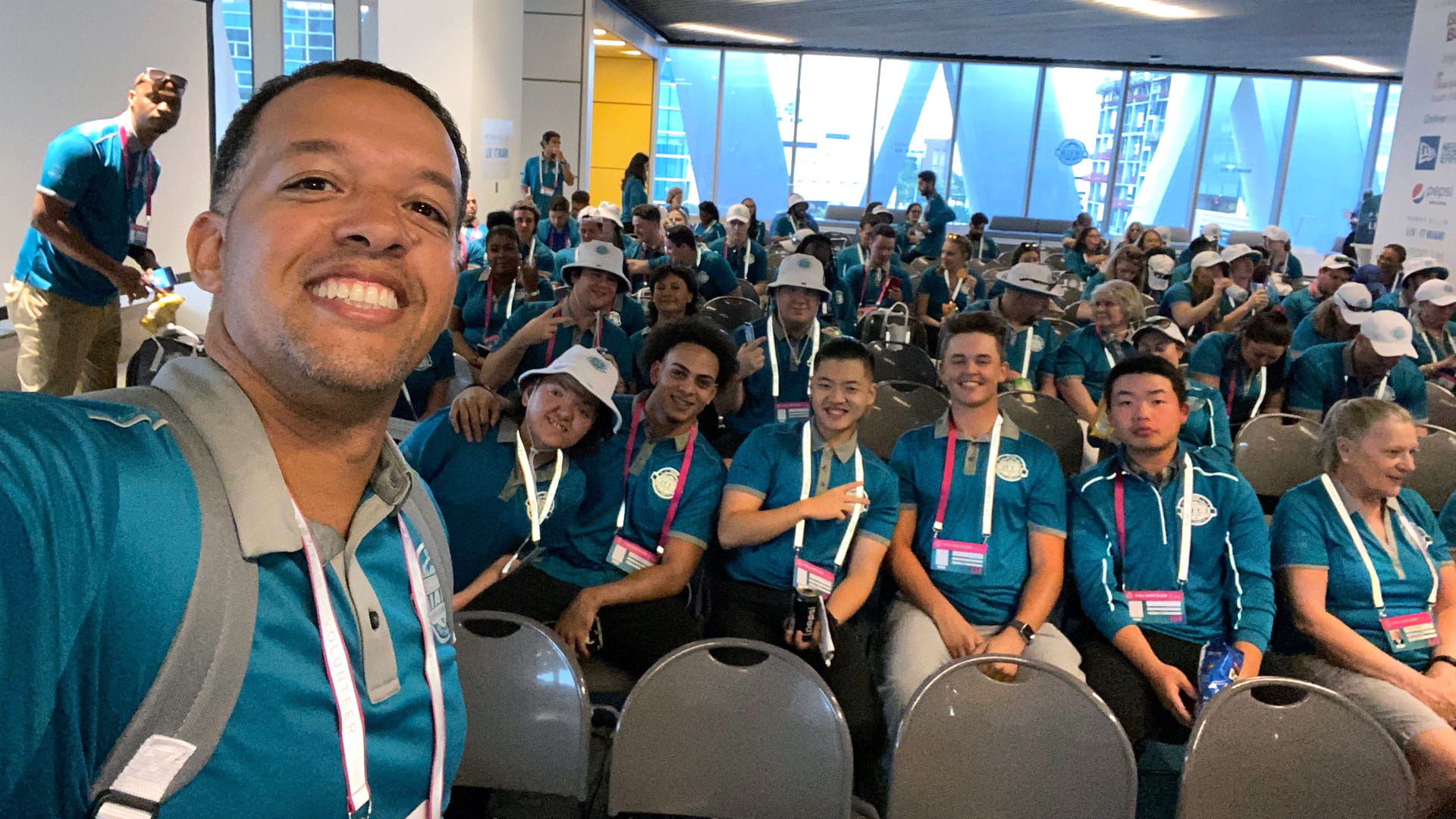 Associate professor Craig Skilling with JWU SEEM Volunteers at Super Bowl LIV