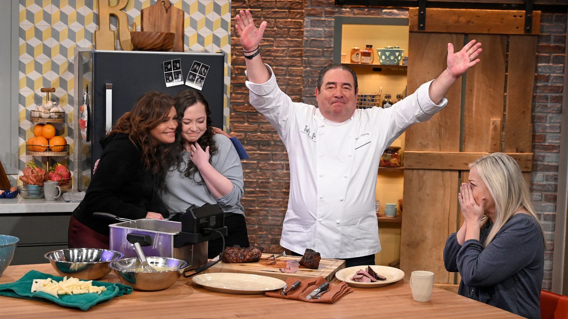 JWU student Alyssa Rosenthal with Rachael Ray and JWU alum Emeril Lagasse