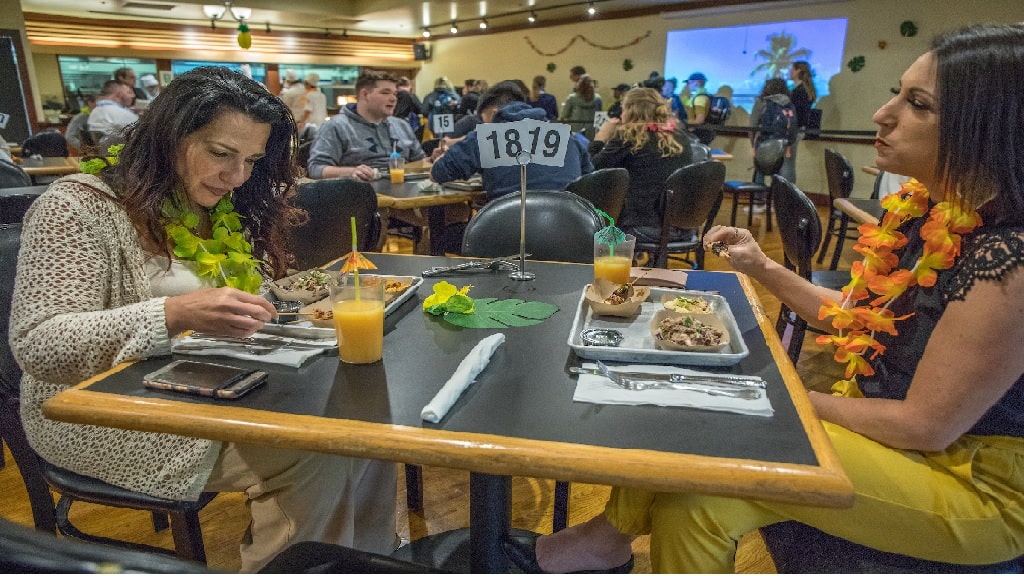 two women eating at a table