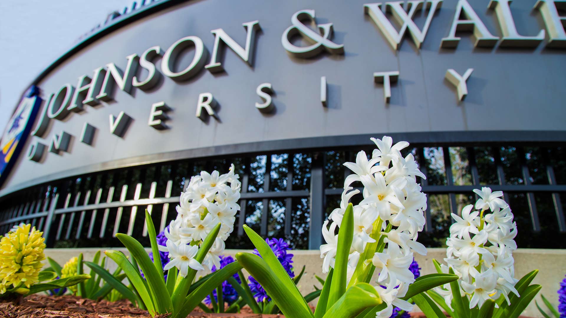 Campus entryway with JWU logo