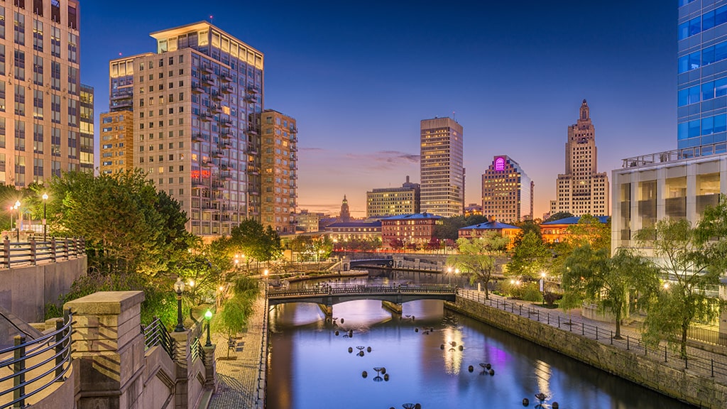 Image at night of Providence skyline with river