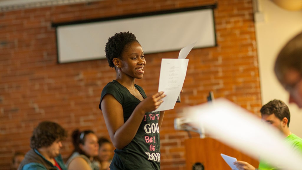 Photo of student presenting to her class