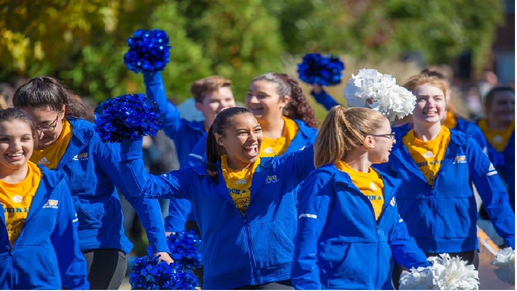 JWU spirit girls with pom poms