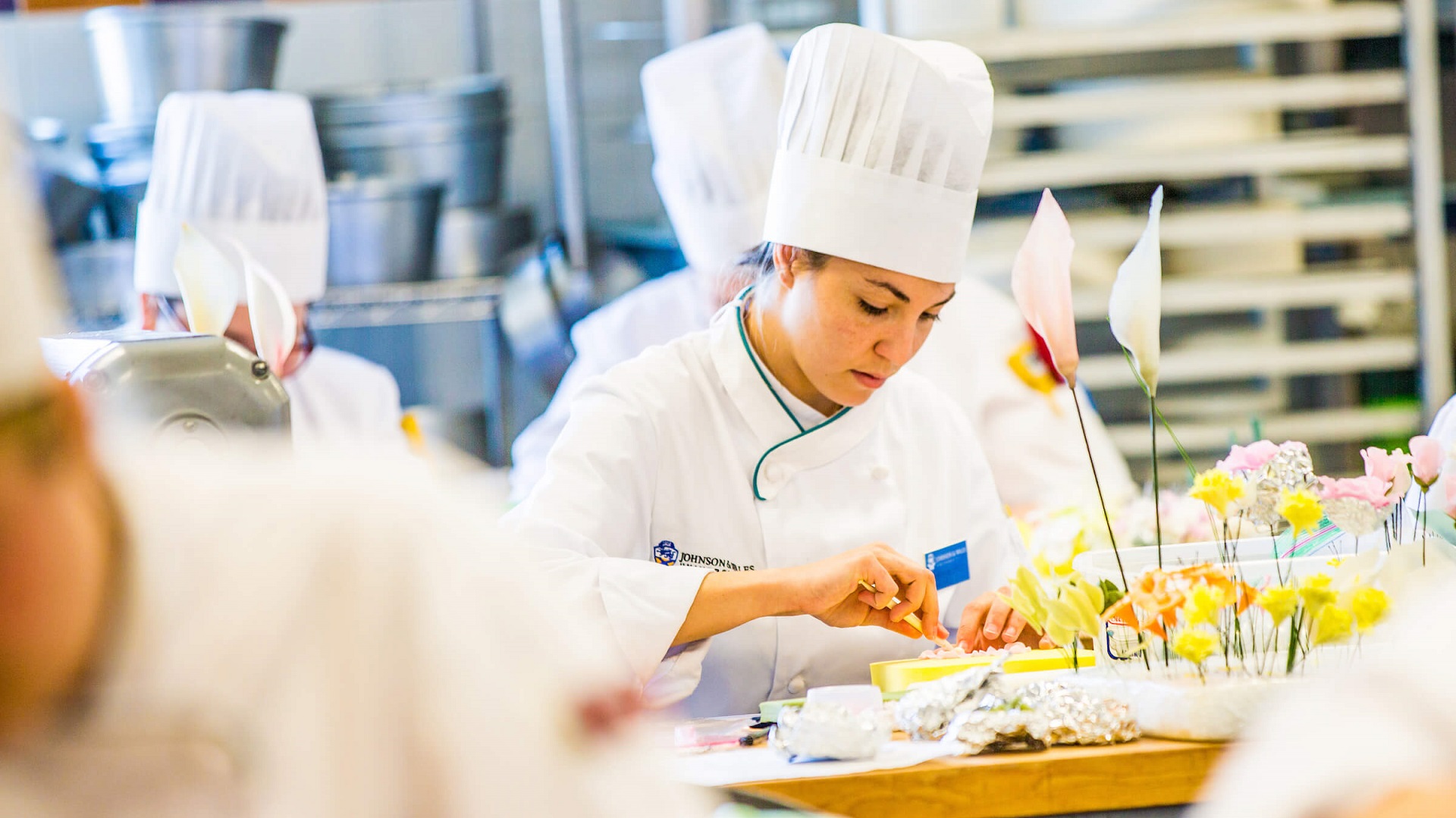 culinary student working with flowers 