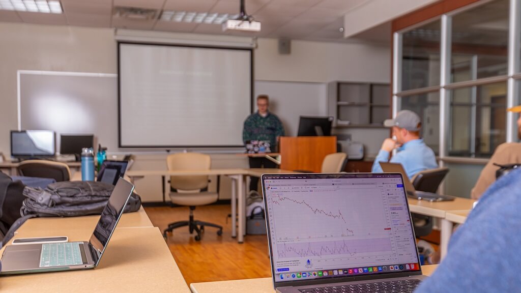 members of the Wildcat Investment Fund gather in the Strategy Lab 