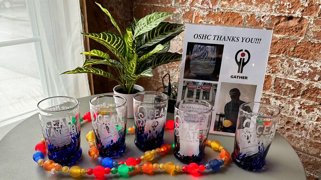 photo showing a row of pint glasses on a table at the Ocean State Homebrew Competition