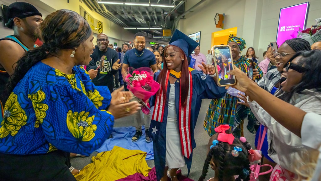 Family celebrating with their graduate.