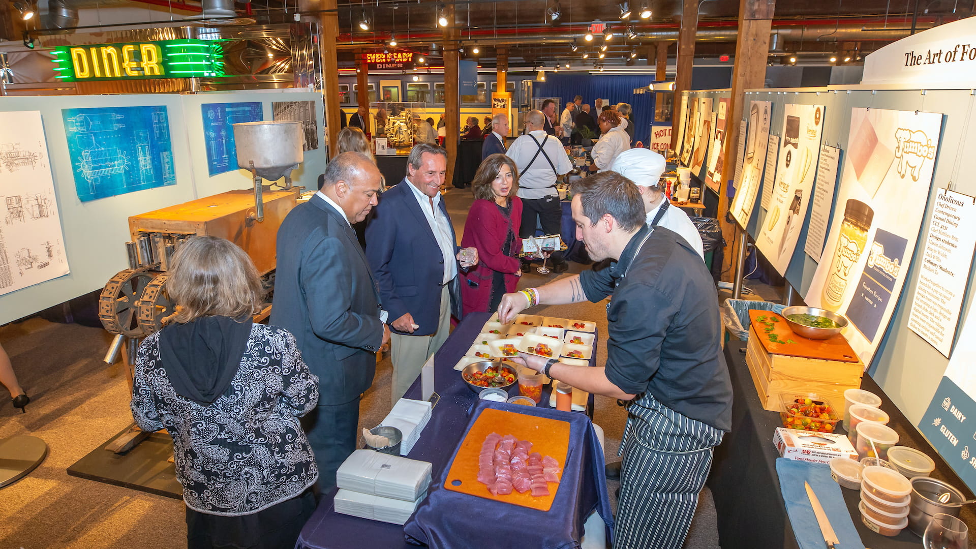 JWU alums serving up small bites at the CFIT 50 Gala.