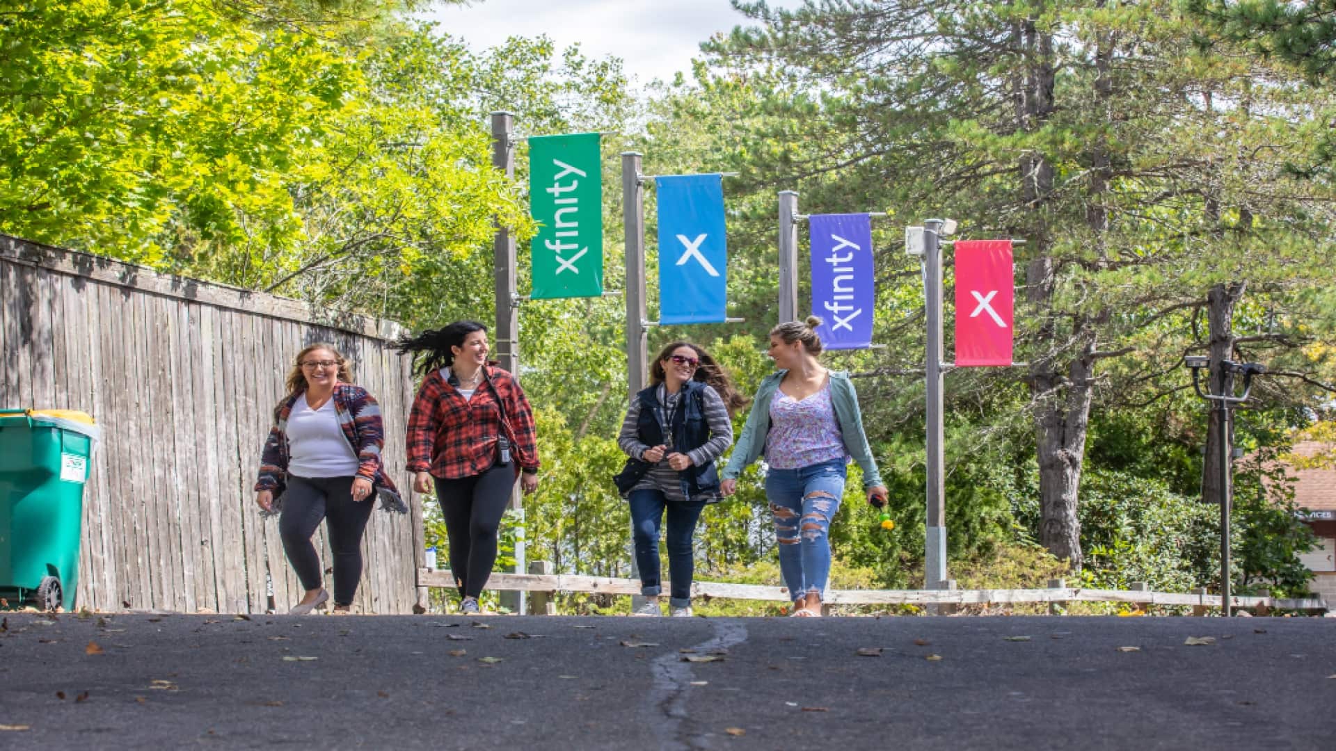 Xfinity alums walking down the street