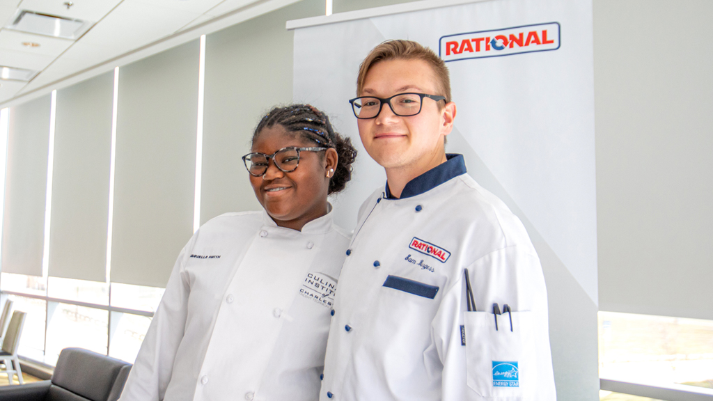 photo of two people, Gabby Smith and Sam Burgess, posing and smiling