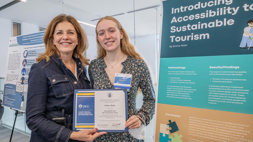 photo of Emma Akian '26 and JWU Providence Campus President Marie Bernardo-Sousa