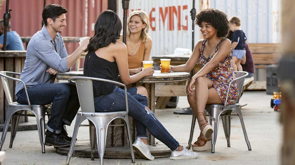 Group of people dining outside. Photo courtesy of Charlotte Regional Visitors Authority.