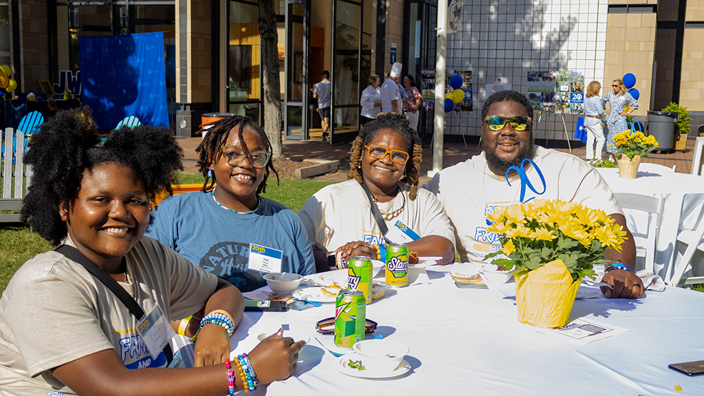 Family in Charlotte celebrating the 20th anniversary