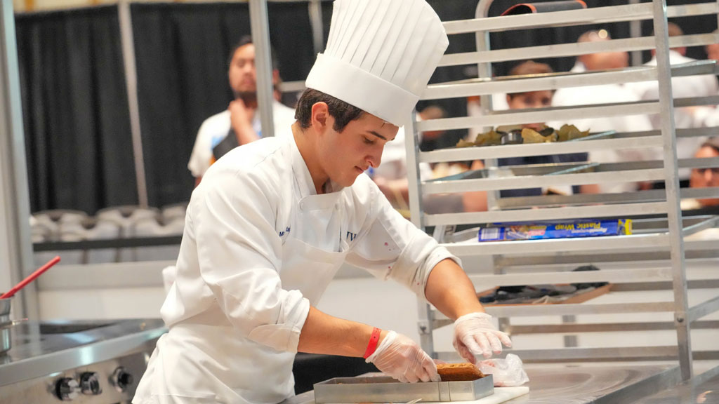 JWU Charlotte baking &amp; pastry student Max Astacio during ACF competition.