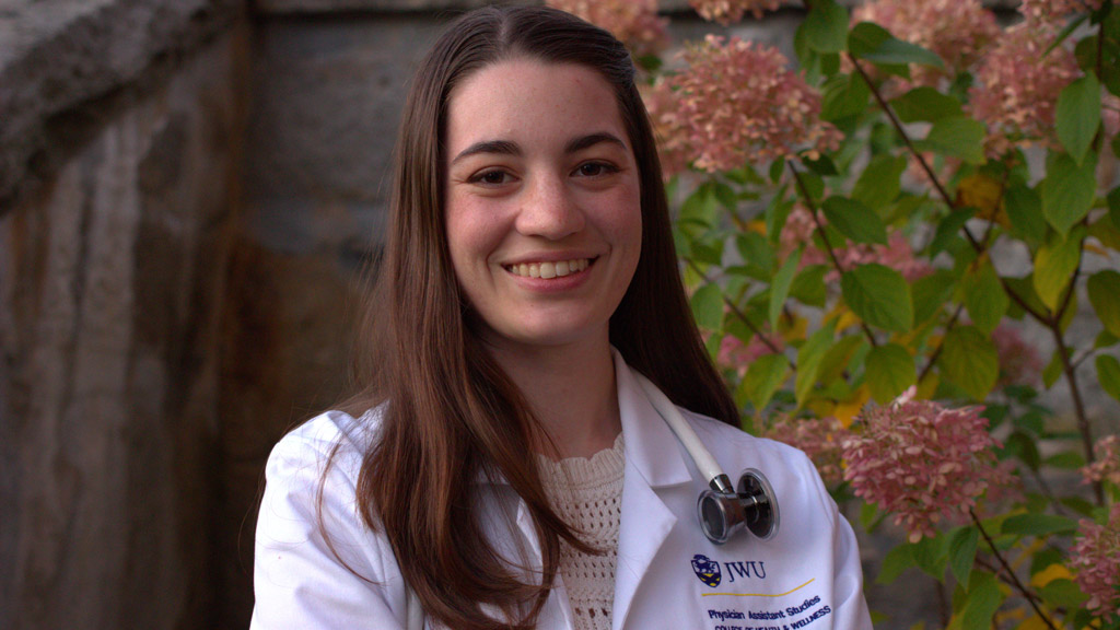 photo of PA student Emily Villalta in lab coat