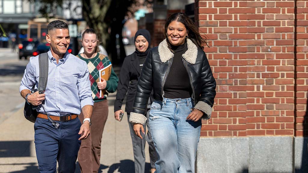 Group of students walking outside.