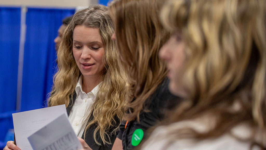 Students networking with employers at the Providence Campus 2026 Spring Job & Internship Fair.