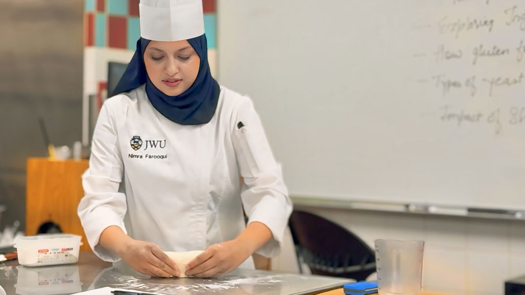 As part of her M.A.T. studies, Nimra Farooqui develops lesson plans for foundation-level learning. 