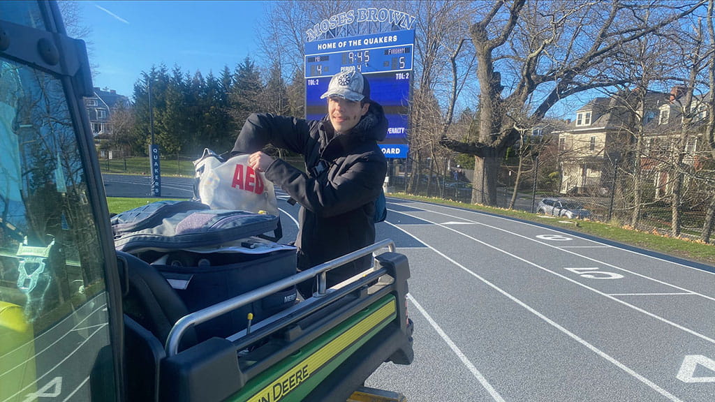 Maxim Allor '26 is photographed on the grounds of Moses Brown School