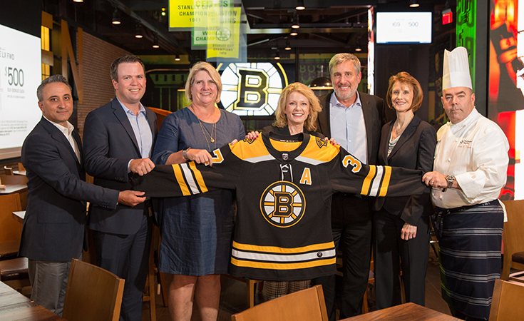 JWU Leadership at TD Garden Holding Bruins Jersey