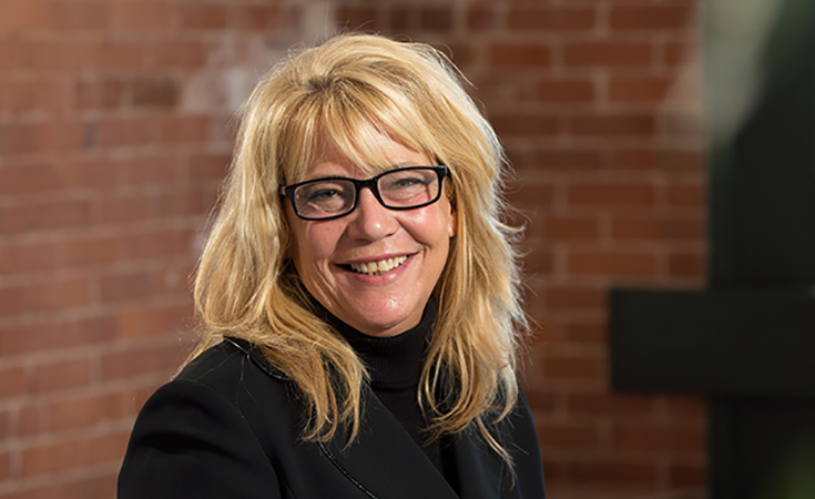 Headshot of JWU Professor Mari Dias, Ed.D. 