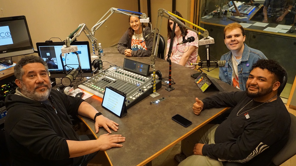 students and host at the Public's Radio studio